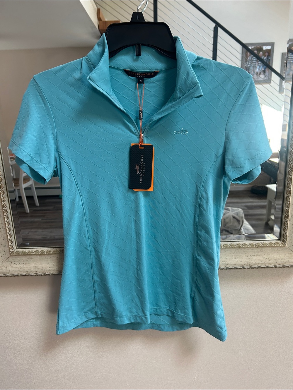 Schockemohle sports Women’s Short Sleeve Zip Mock Collar Polo in Aqua